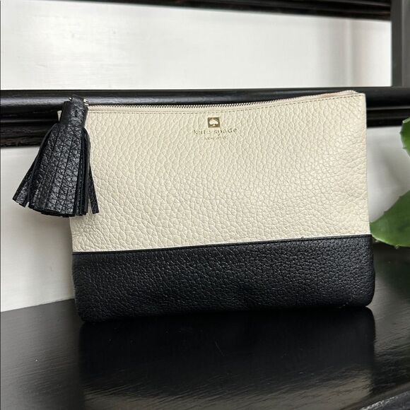 Kate Spade genuine leather color black neutral clutch purse like new tassel
